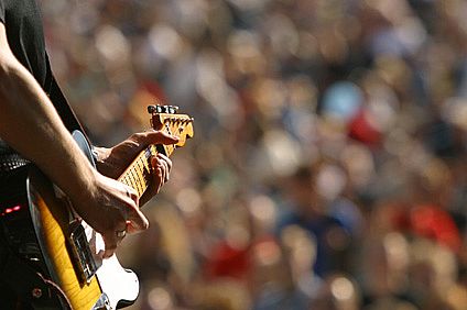 Guitar player on stage at concert